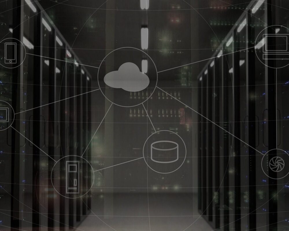 Server room aisle with an overlaid cloud and connected devices network diagram
